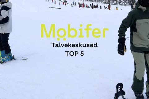Lumelauasõitjad suusanõlva ääres