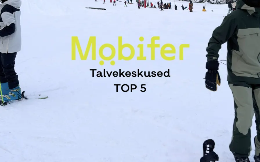 Lumelauasõitjad suusanõlva ääres